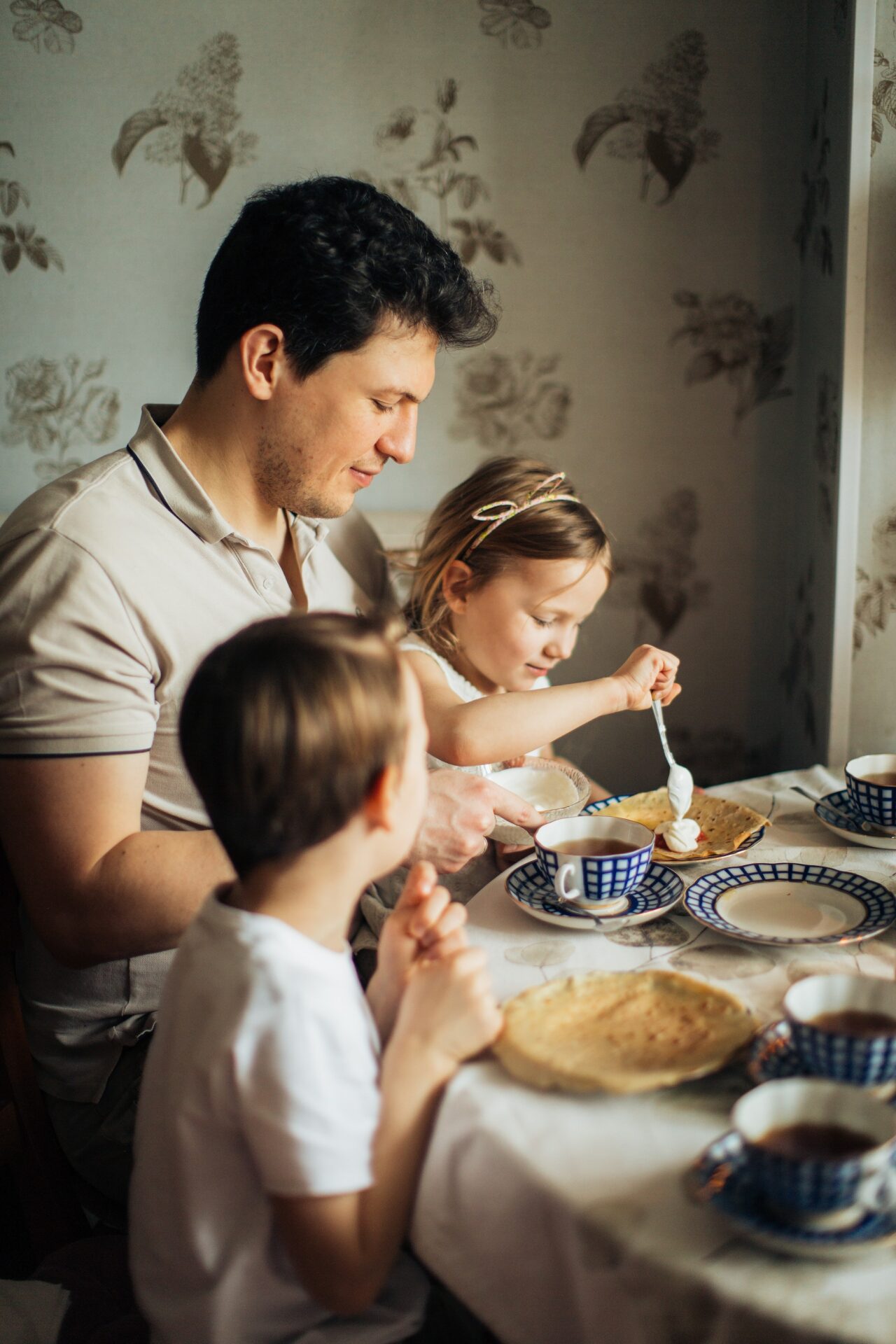 Family Sitting at Table