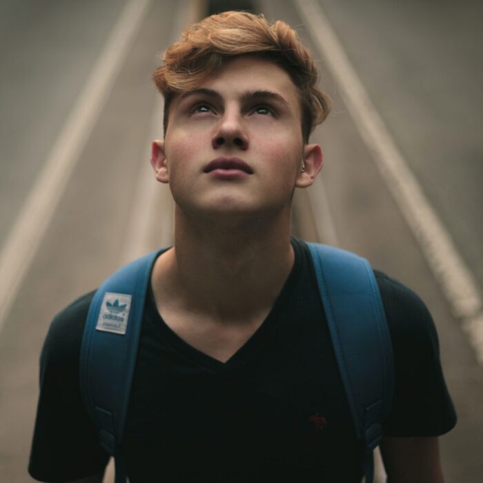 Man Standing in the Middle of Road