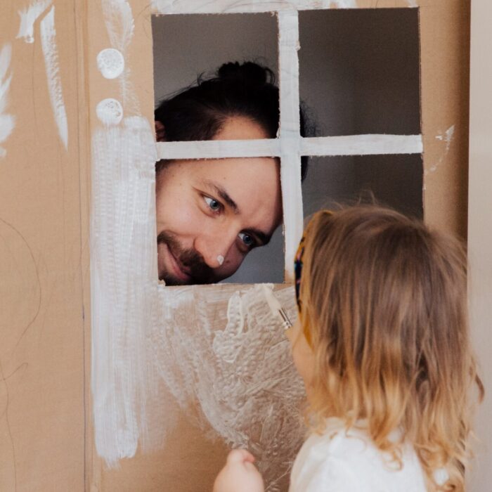 A Man Playing with his Little Daughter