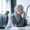 Woman in Gray Knit Sweater Praying