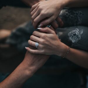 man and woman holding each others hands