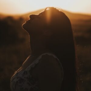 silhouette of woman during sunset