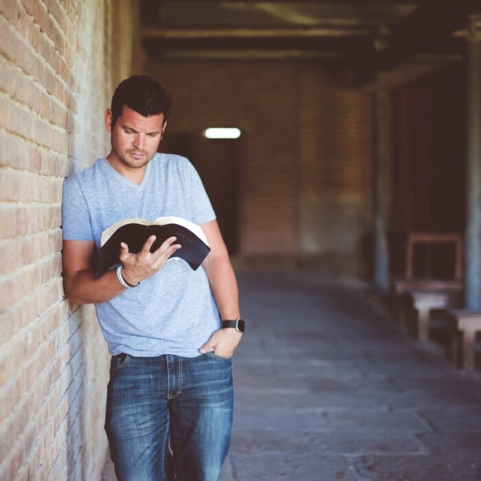 man reading book